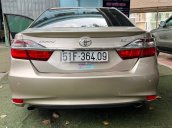 Xe Toyota Camry 2.5Q năm sản xuất 2015, màu vàng đồng, xe gia đình sử dụng giữ gìn cẩn thận còn rất mới