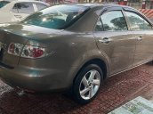 Cần bán gấp Mazda 6 2.0 AT sản xuất 2005, màu xám số tự động