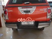 Bán ô tô Toyota Hilux E MT sản xuất 2016, màu đỏ chính chủ, giá chỉ 525 triệu