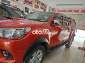 Bán ô tô Toyota Hilux E MT sản xuất 2016, màu đỏ chính chủ, giá chỉ 525 triệu