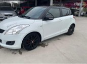 Bán Suzuki Swift 1.4 AT sản xuất năm 2014, màu trắng