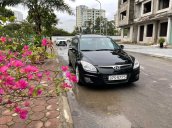 Cần bán gấp Hyundai i30 CW 1.6AT năm 2009, màu đen