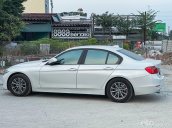 Siêu phẩm BMW 320i Model 2014 - Nhập Đức - Nội thất kem - 1 chủ từ đầu - Biển Sài Gòn