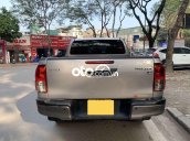 Bán Toyota Hilux E AT sản xuất 2021, màu bạc, nhập khẩu nguyên chiếc còn mới
