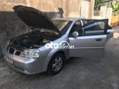 Bán Daewoo Lacetti MT năm sản xuất 2004, màu bạc, 101tr