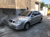 Bán Daewoo Lacetti MT năm sản xuất 2004, màu bạc, 101tr