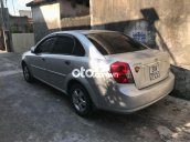 Bán Daewoo Lacetti MT năm sản xuất 2004, màu bạc, 101tr