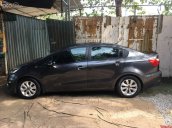 Bán xe Kia Rio 1.4 AT màu đen, sản xuất cuối 2015, xe nhập khẩu nguyên chiếc Hàn Quốc, 1 chủ đi từ đầu