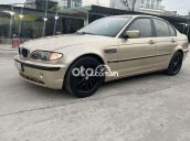 Bán xe BMW 318i sản xuất năm 2002, màu vàng