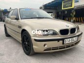 Bán xe BMW 318i sản xuất năm 2002, màu vàng