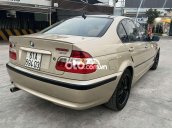 Bán xe BMW 318i sản xuất năm 2002, màu vàng