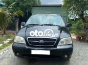 Bán ô tô Kia Carnival năm sản xuất 2007, màu đen xe gia đình, giá chỉ 200 triệu