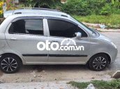 Cần bán gấp Chevrolet Spark LT sản xuất 2009, màu bạc