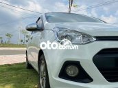 Cần bán Hyundai Grand i10 sản xuất 2014, màu trắng, nhập khẩu nguyên chiếc