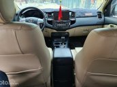 Xe Toyota Fortuner 2.7V 4x2 AT năm 2015, màu trắng số tự động, giá chỉ 599 triệu