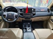 Xe Toyota Fortuner 2.7V 4x2 AT năm 2015, màu trắng số tự động, giá chỉ 599 triệu