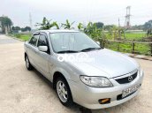 Cần bán gấp Mazda 323 năm sản xuất 2004, màu bạc, xe nhập giá cạnh tranh