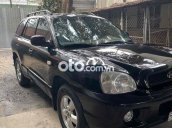 Cần bán gấp Hyundai Santa Fe năm 2004, màu đen, xe nhập còn mới