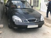 Cần bán xe Daewoo Nubira sản xuất 2001, màu đen xe gia đình