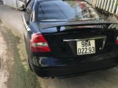 Cần bán xe Daewoo Nubira sản xuất 2001, màu đen xe gia đình