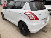 Cần bán lại xe Suzuki Swift 1.4AT năm sản xuất 2015, màu trắng