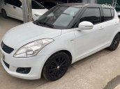 Cần bán lại xe Suzuki Swift 1.4AT năm sản xuất 2015, màu trắng