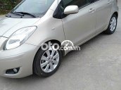 Xe Toyota Yaris sản xuất năm 2010, màu vàng, 350 triệu