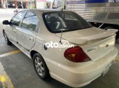 Cần bán gấp Kia Spectra sản xuất năm 2004, màu trắng 