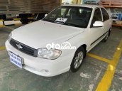 Cần bán gấp Kia Spectra sản xuất năm 2004, màu trắng 