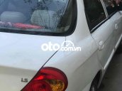 Bán xe Kia Spectra sản xuất 2004, màu trắng, nhập khẩu, giá 100tr