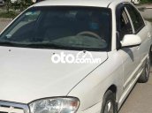 Bán xe Kia Spectra sản xuất 2004, màu trắng, nhập khẩu, giá 100tr