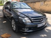 Bán Mercedes C200 năm 2010, màu đen xe gia đình