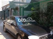 Cần bán Kia Spectra năm 2005 xe gia đình