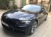 xe BMW 328i màu xanh đen đời cuối năm 2013