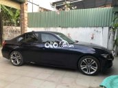 xe BMW 328i màu xanh đen đời cuối năm 2013