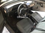 ban xe mazda 323 mau xanh, sx 1995, xe tot ko