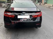 Camry còn mới cần bán.