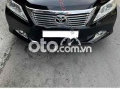 Camry còn mới cần bán.