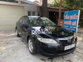 Gia đình em cần bán Mazda năm chỗ còn rất đẹp