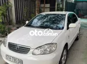Đổi xe cần bán toyota Altis 1.8 bstp