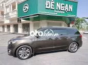 Kia Sedona 2016 GATH, máy xăng full, màu nâu xám