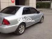 Ford Laser Ghia 1.8, 2003 đẹp, màu bạc, tại Hà Nội