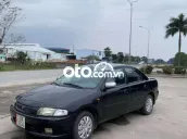 Mazda 323 1.6MT Đen 2000