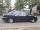 Em cần bán XE kia spectra 2004,xe nhà dùng tất