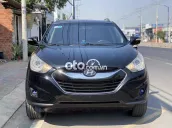 Bán xe Hyundai Tucson 2010, màu đen, số tự động.