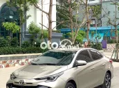 Toyota Vios 1.5E CTV 2023 Vàng Cát