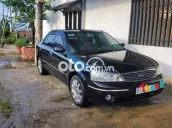 Ford Laser Ghia 1.8 2003 Đen