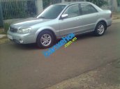 Xe Ford Laser  2004