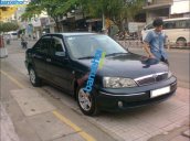 Xe Ford Laser  2003