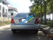 Xe Ford Laser  2004